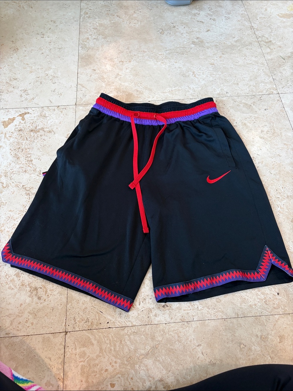 Nike Black Athletic Shorts with Red and Purple Accents